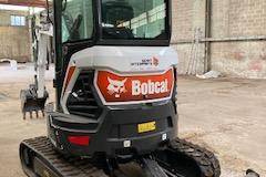  Grue Bobcat + remorque porte engin+grappin 